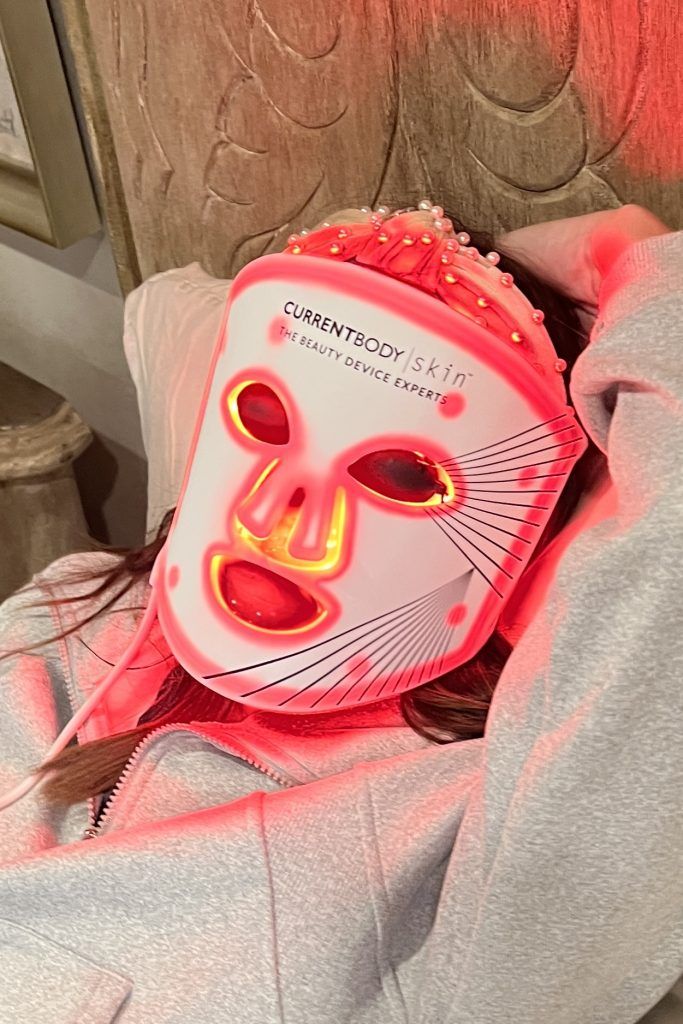 CurrentBody Skin LED Mask styled with pearl headband, flexible silicone glow
