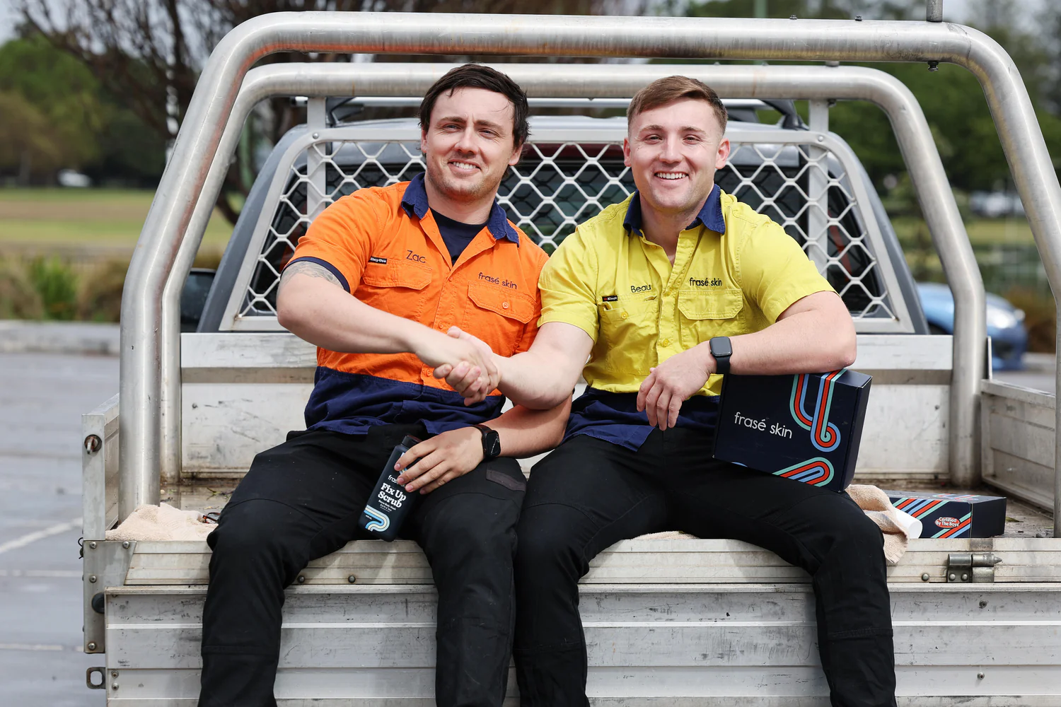 Frasé Skin founders Zach and Beau London on the back of a ute, Newcastle NSW