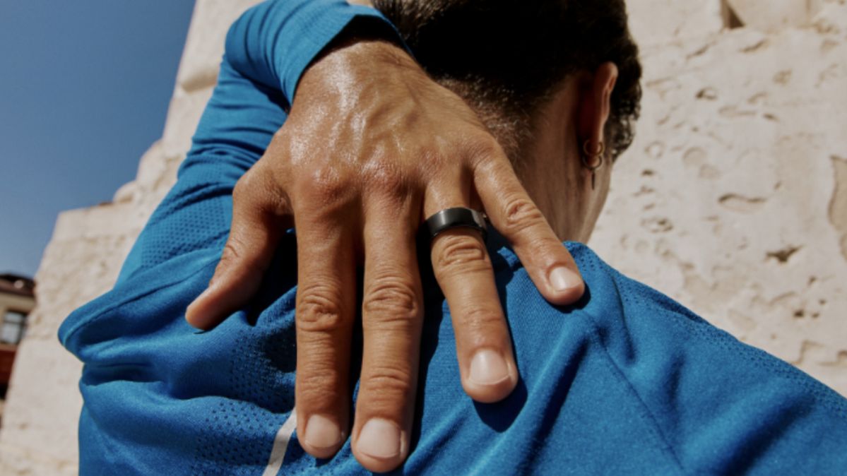 Oura ring on hand, heritage finish, the only wearable our editors keep wearing
