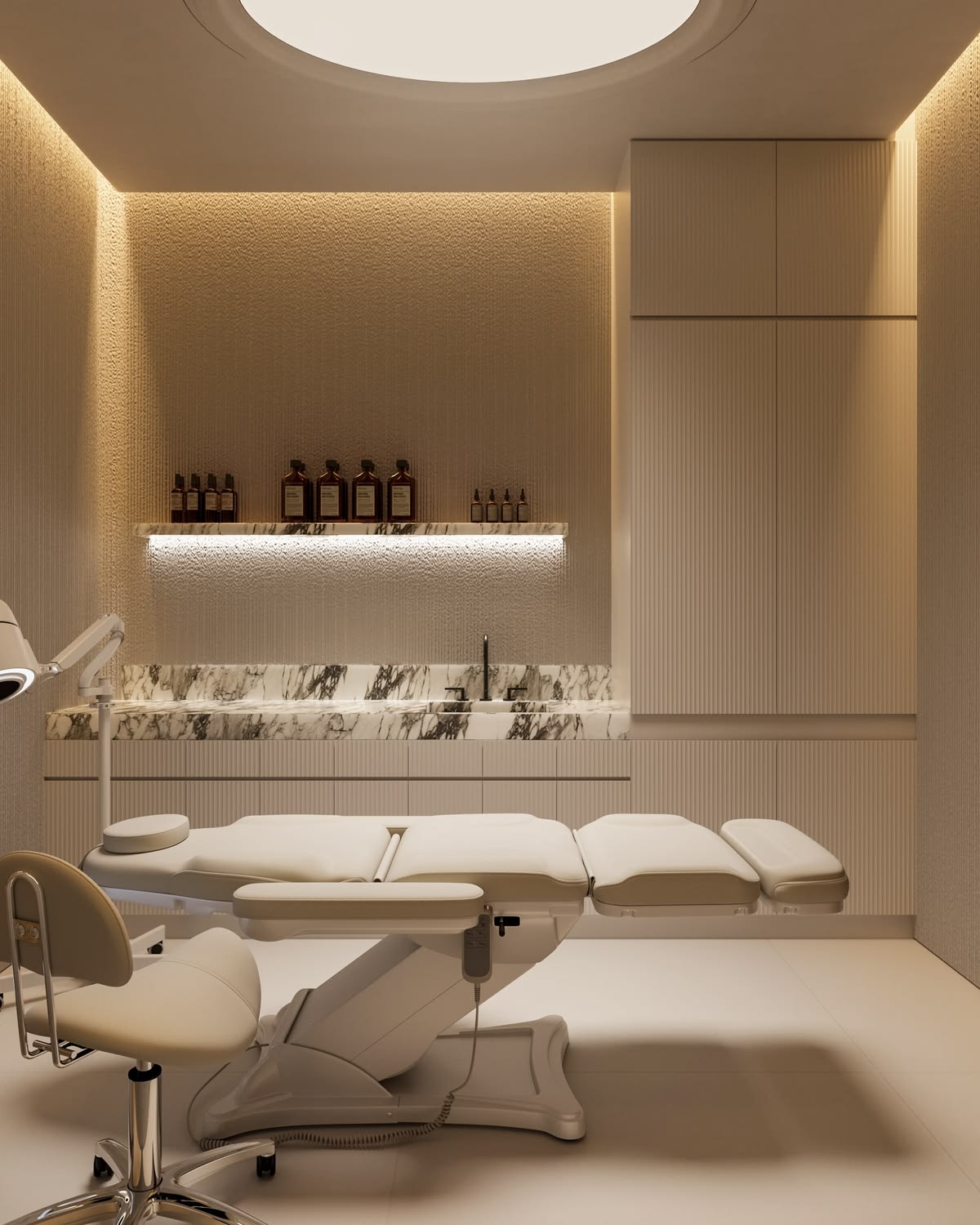 Editorial portrait of a luxury treatment room, warm-lit twin beds against a bronze-toned arched alcove.