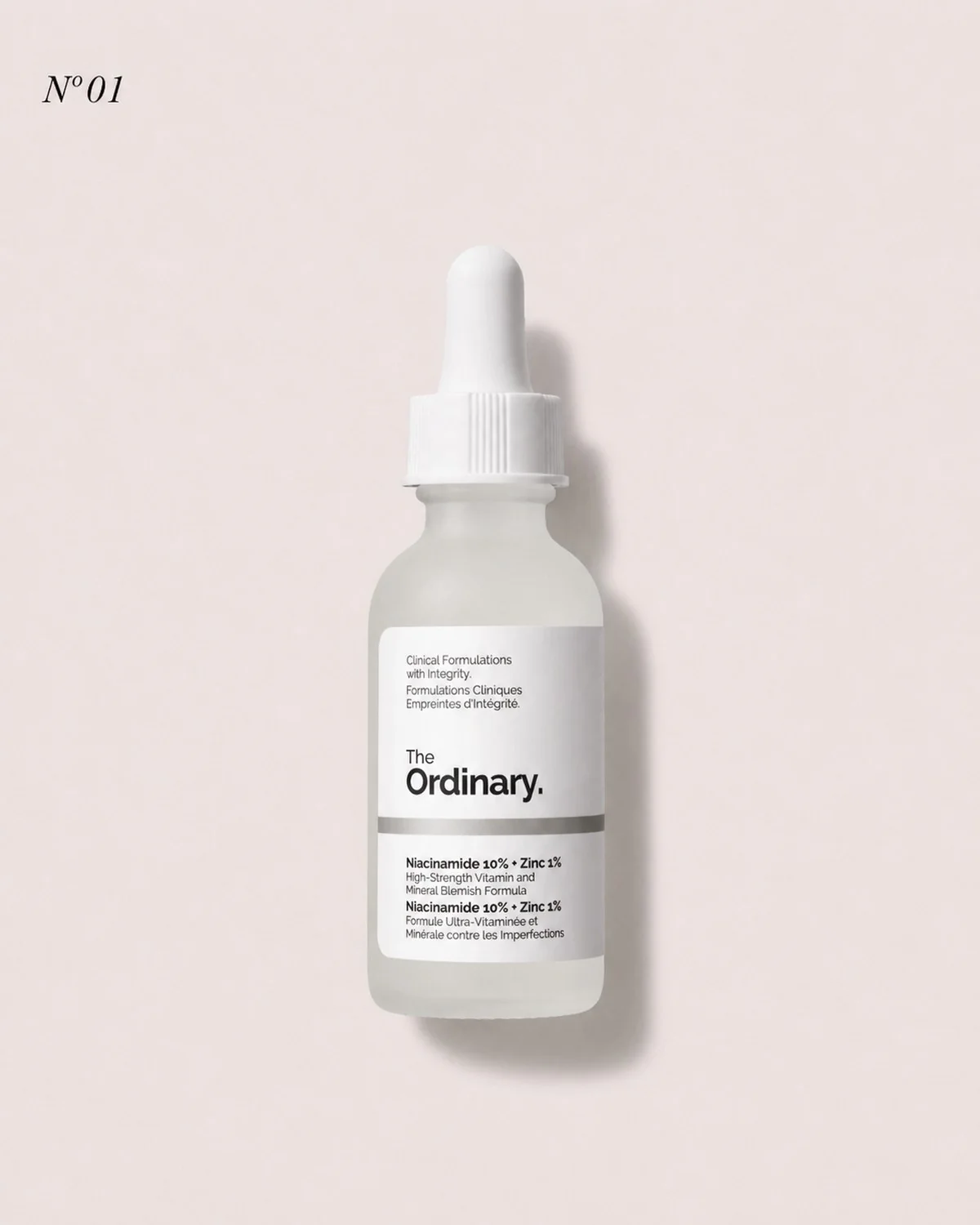The Ordinary Niacinamide 10% and Zinc 1% serum bottle on white background