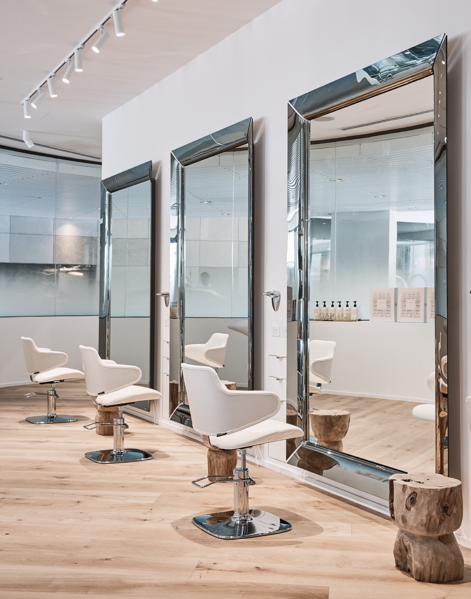 Koda Cutters, white cutting room with mirrors